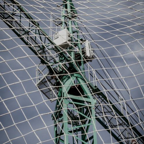 Crane net for hire from Allied Perimeter Safety Netting used below crane